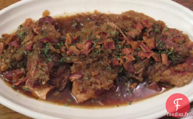 Côtelettes De Porc Étouffées Cuites Lentement