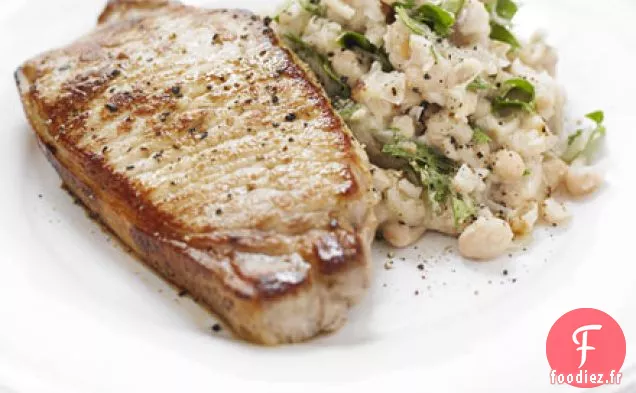 Porc avec purée de haricots à l'ail