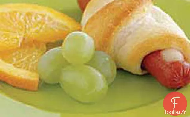 Cochons au fromage dans des couvertures
