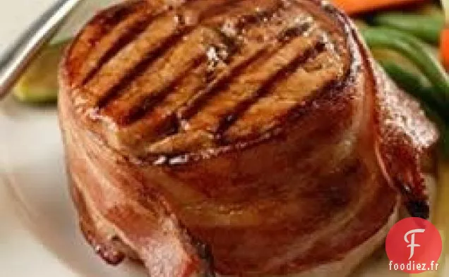 Côtelettes De Porc Enrobées De Bacon Et Beurre Assaisonné