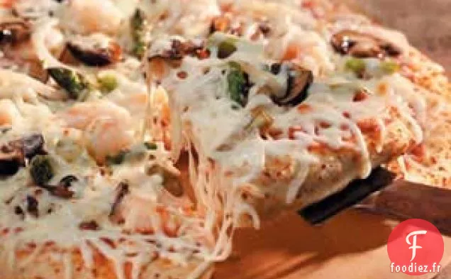 Pizza aux crevettes et légumes