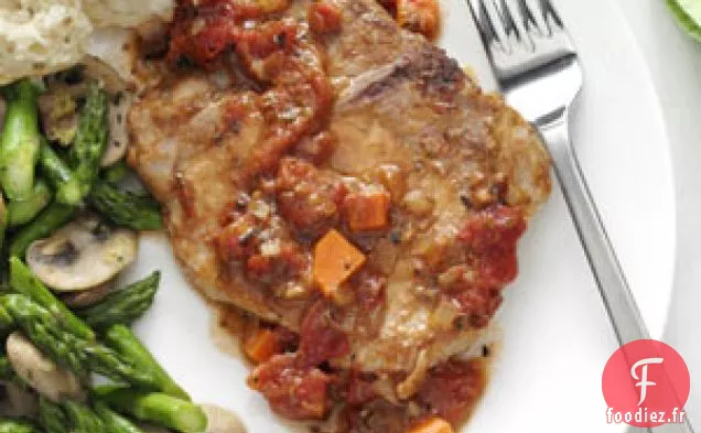 Côtelettes De Porc Italiennes Garnies De Tomates