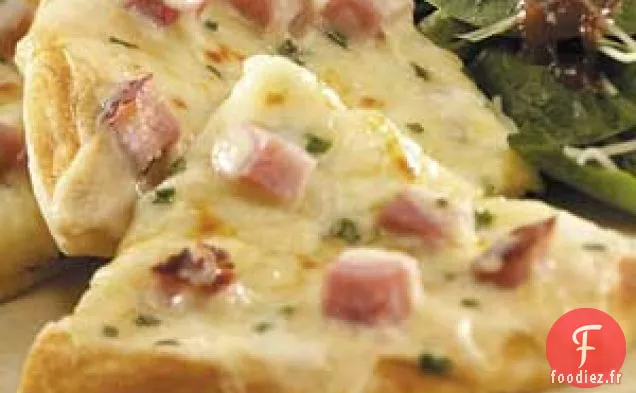 Pizzas au jambon et au fromage