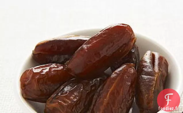 Épaule d'Agneau Rôtie avec Couscous et Farce aux Dattes