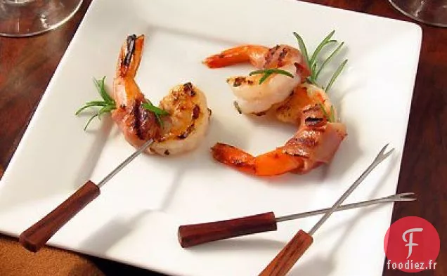 Crevettes grillées enveloppées de Prosciutto à l'Orange et au Romarin