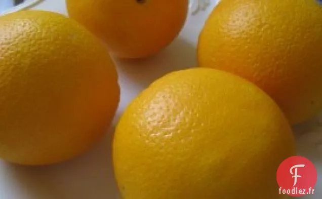 Cupcakes À L'Orange Et À La noix De Coco Avec Glaçage Au Fromage À La Crème À L'Orange